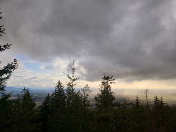 Mount Peak Pinnacle Peak Fire Lookout View Over Enumclaw and Buckley with a mix of Rain and Sunshine